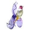 Idyllia Gouldian Finch og orkidé