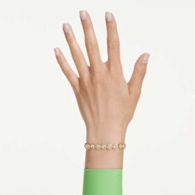 Una Angelic-armbånd, rundslibede karamellfarvede krystaller, guldbelagt Una Angelic-armbånd, rundslibede karamellfarvede krystaller, guldbelagt