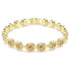 Una Angelic-armbånd, rundslibede karamellfarvede krystaller, guldbelagt Una Angelic-armbånd, rundslibede karamellfarvede krystaller, guldbelagt